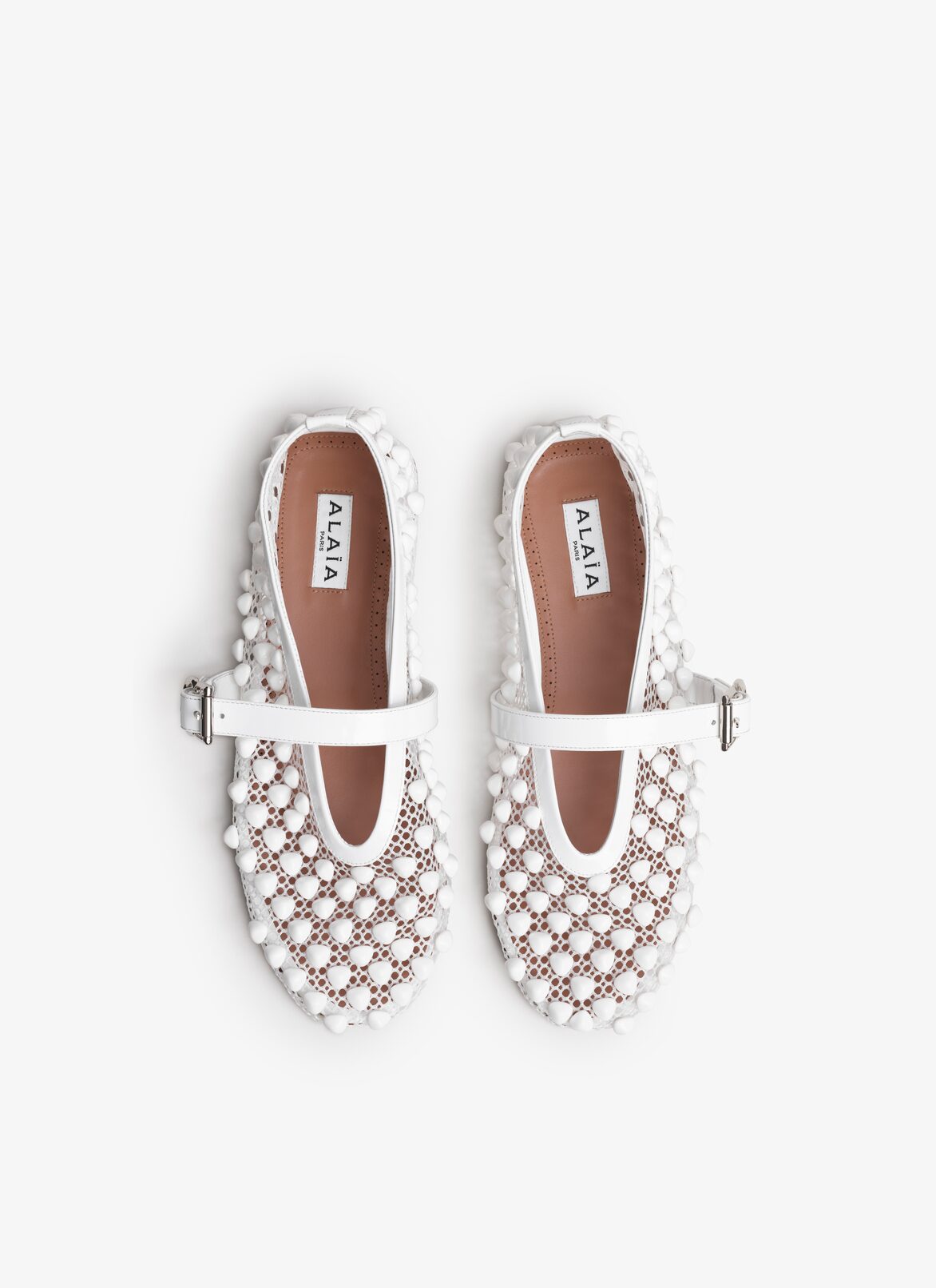 BALLET FLATS WITH STUDS ON FISHNET ALAÏA WHITE BALLET FLATS WITH STUDS ON FISHNET
